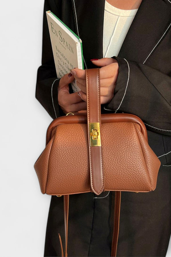 לורה - תיק רטרו